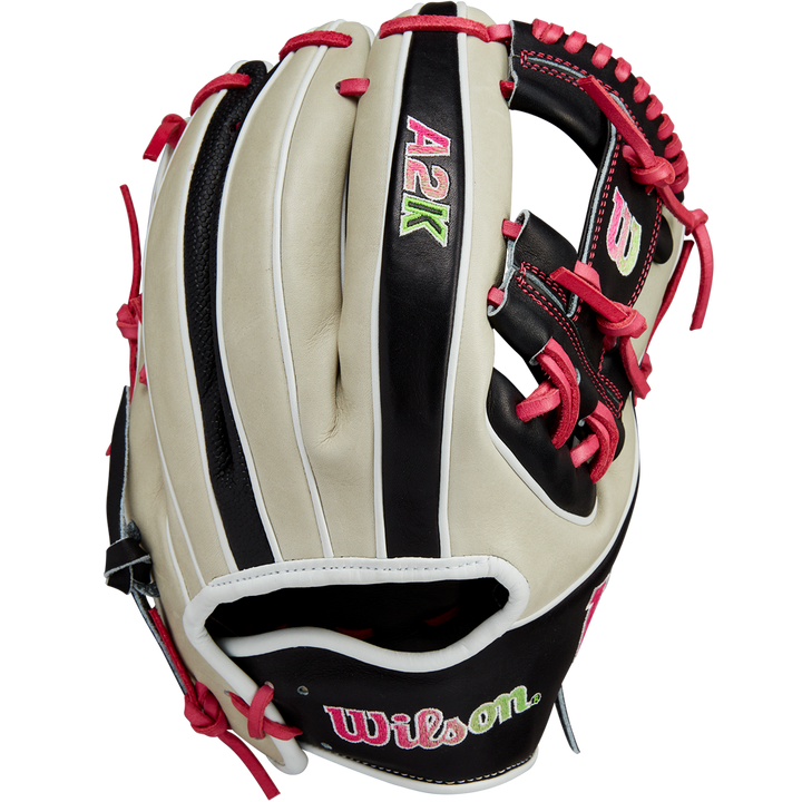 The Wilson A2K 1724 11.75" Baseball Glove (GOTM June 2024: WBW1022571175) features cream and black Pro Stock Select leather, red laces and stitching, colorful embroidered logos, and is part of the exclusive Wilson Glove of the Month series.
