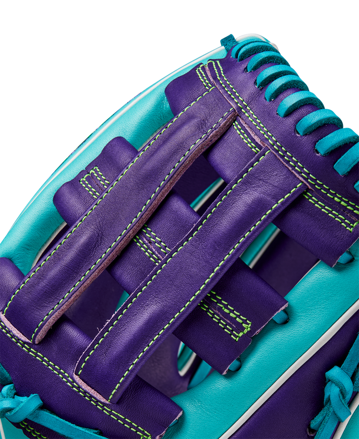 Close-up of the Wilson A2000 DW5 12" Baseball Glove (WBW10252212), showcasing purple Pro Stock leather with teal accents, teal stitching and laces, and a woven web—expertly crafted for Winter 2024.