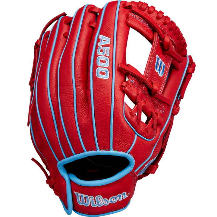 The Wilson A500 11.5" Baseball Glove (WBW102540115) features a red design with light blue accents and stitching, open web style, and Wilson plus A500 embroidered in white and blue.