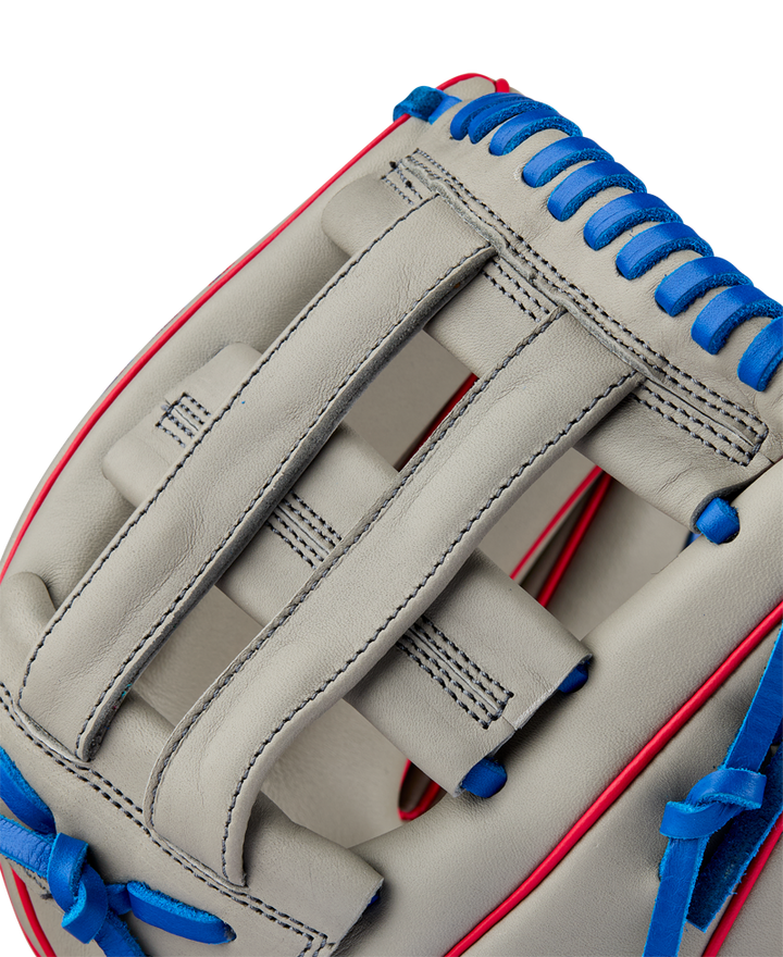 Close-up of the Wilson A900 PF12 12" Baseball Glove (WBW10257112), a light gray youth glove with blue laces, red trim, and detailed stitching—perfect Pedroia Fit utility glove for young players.