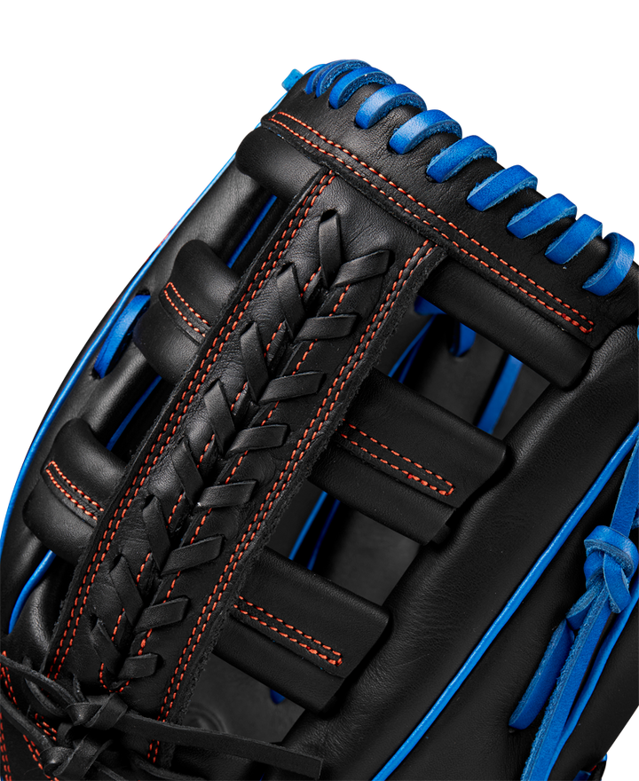 Close-up of a Wilson A1000 PF1892 12.25" Baseball Glove (WBW1025831225) with red stitching and blue laces, featuring Full Grain leather weaving and Wilson’s exceptional craftsmanship.