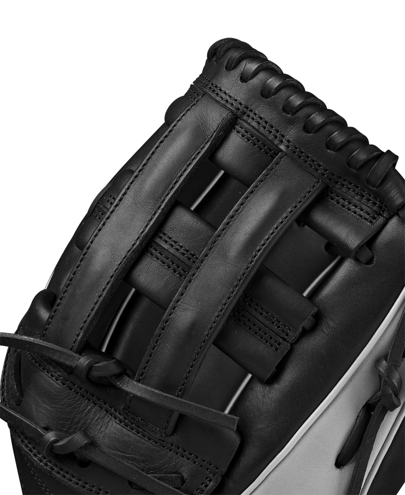Close-up of the Wilson A1000 1750 12.5" Baseball Glove (WBW102585125) in black and gray Full Grain leather, highlighting its detailed webbing and stitching.
