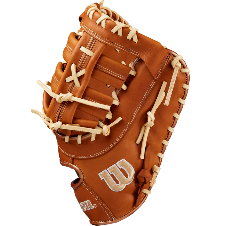 The Wilson A1000 1620 12.5" Baseball First Base Mitt (WBW102587125) features brown Full Grain leather, cream laces, and a white stitched W logo, displayed to highlight its webbing and stitching details.