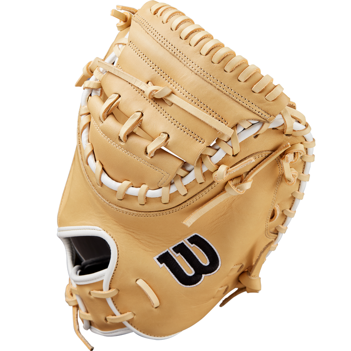 The Wilson A1000 CM33 33" Baseball Catcher's Mitt (WBW10258933) features tan full grain leather, white laces, and a black W logo on the side, displayed against a plain white background.