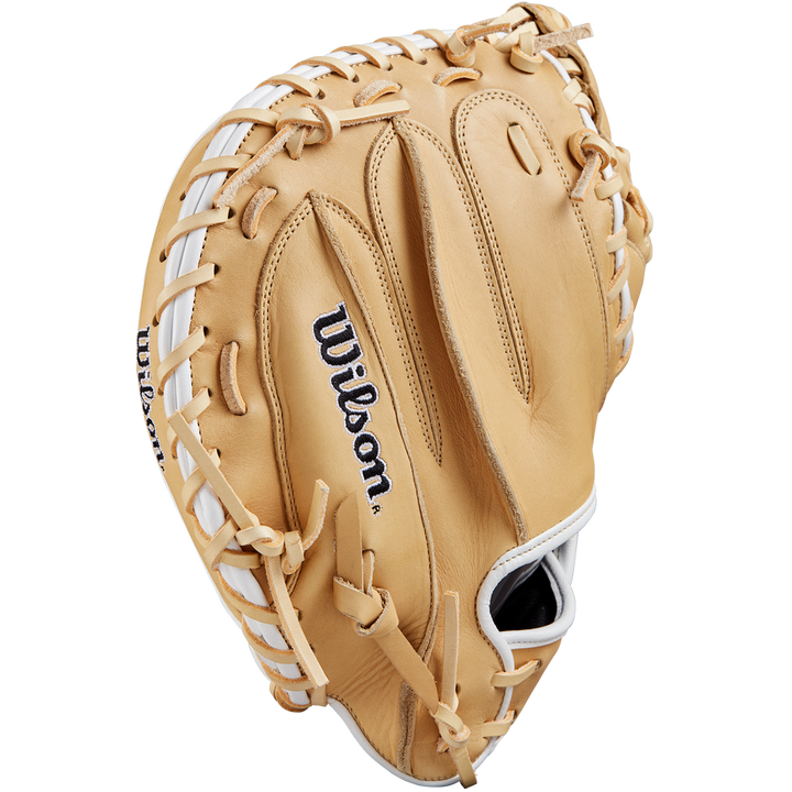 The Wilson A1000 CM33 33" Catcher's Mitt by Wilson, crafted from Full Grain leather in tan with white lacing and a dark blue stitched Wilson logo on the palm, is displayed against a plain white background.