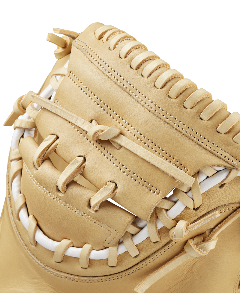 Close-up of the Wilson A1000 CM33 33" Baseball Catcher's Mitt (WBW10258933) shows detailed lacing, stitching, white leather accents, and the quality craftsmanship this full-grain leather Wilson mitt is known for.