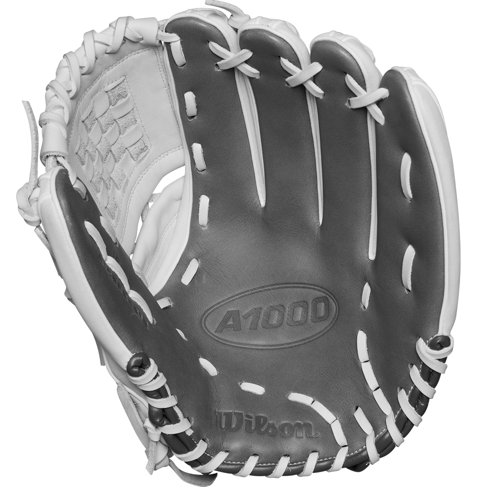 A black and white photo of the Wilson A1000 P12 12" Fastpitch Glove (WBW10259212) with white laces, made from Full Grain leather, features the Wilson brand and model name clearly visible on the palm.