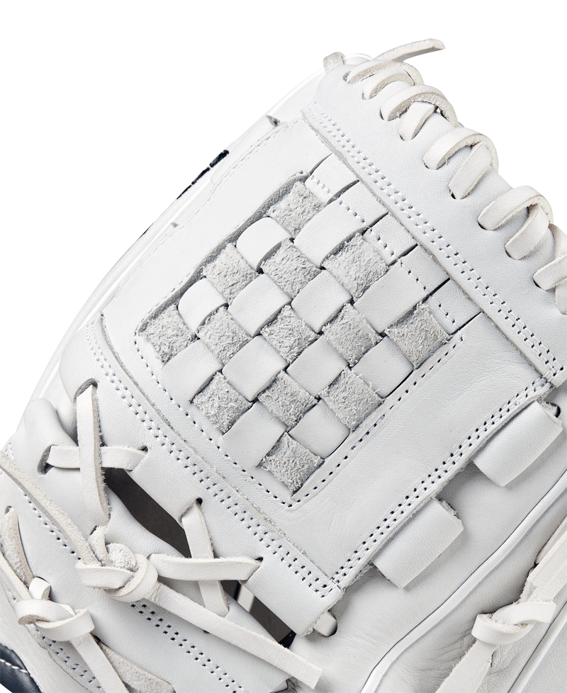 Close-up of the Wilson A1000 P12 12" Fastpitch Glove (WBW10259212), featuring detailed stitching, laces, and a woven pocket pattern on white full grain leather against a plain background.