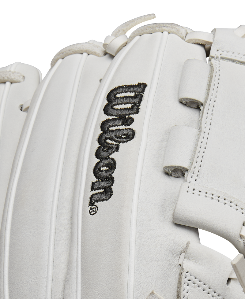A close-up of the Wilson A1000 P12 12" Fastpitch Glove (WBW10259212) highlights its detailed stitching, black Wilson logo, and durable full-grain leather surface.