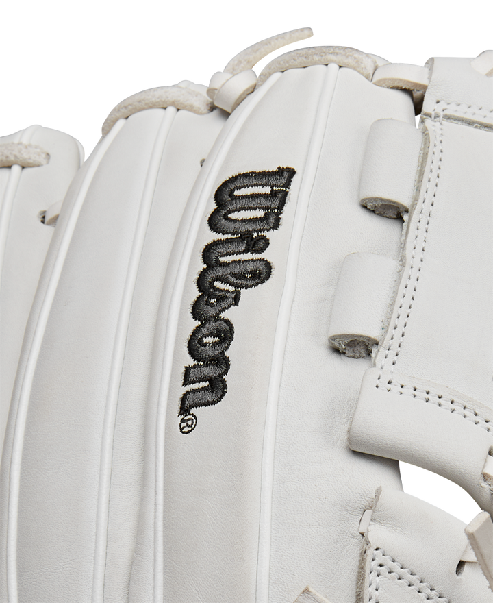 A close-up of the Wilson A1000 P12 12" Fastpitch Glove (WBW10259212) highlights its detailed stitching, black Wilson logo, and durable full-grain leather surface.
