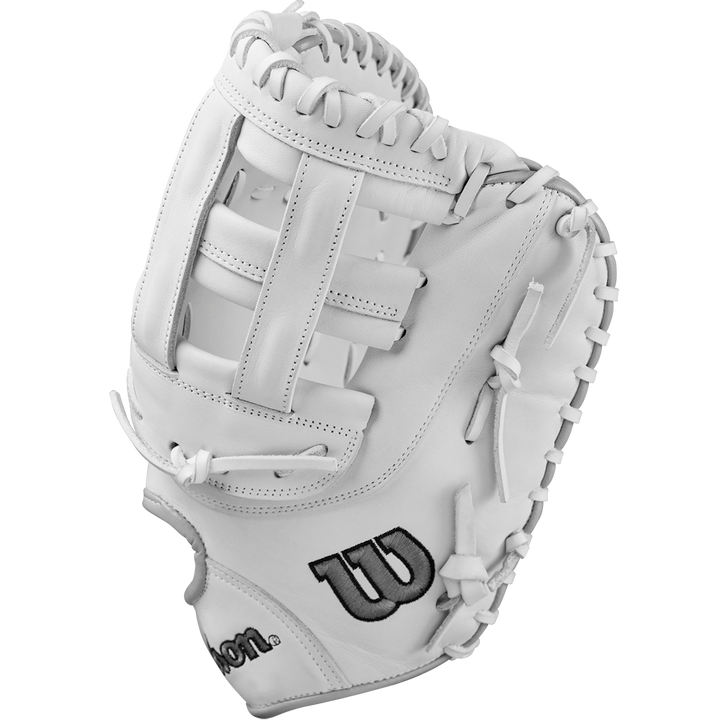 The Wilson A1000 1620 12.5" Fastpitch First Base Mitt (WBW102598125) features white full grain leather, black stitching, and the Wilson logo on the thumb, displayed against a plain white background.