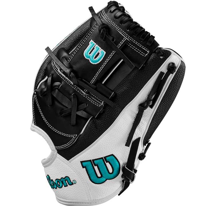 A Wilson A2000 H12SS 12" Fastpitch Glove (WBW10262412) in black and white with teal Wilson logos, black laces, and durable SuperSkin, is photographed against a plain white background.