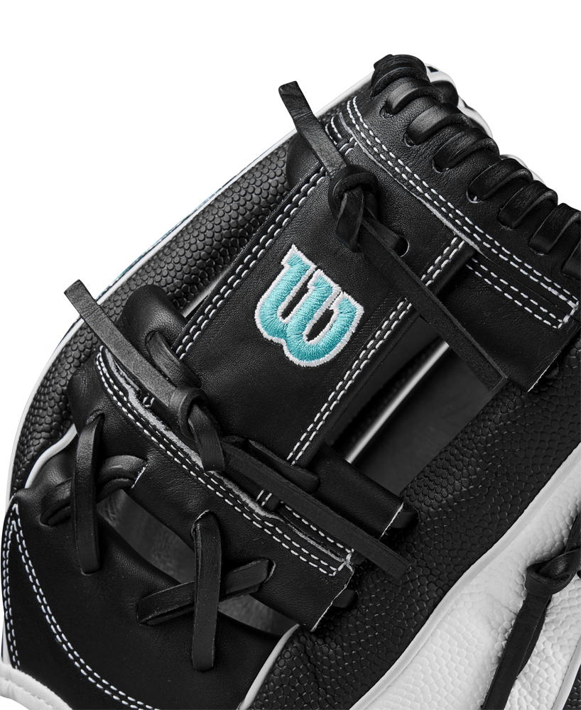 Close-up of a Wilson A2000 H12SS 12" Fastpitch Glove (WBW10262412) in black leather with white stitching and laces, durable SuperSkin, and a blue and white embroidered W logo on the wrist.