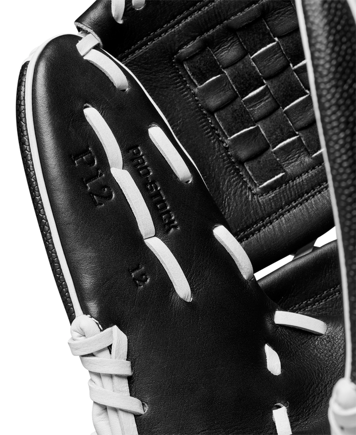 A close-up of the Wilson A2000 P12 12" Fastpitch Glove (WBW10267512) highlights its intricate lacing and detailed design.