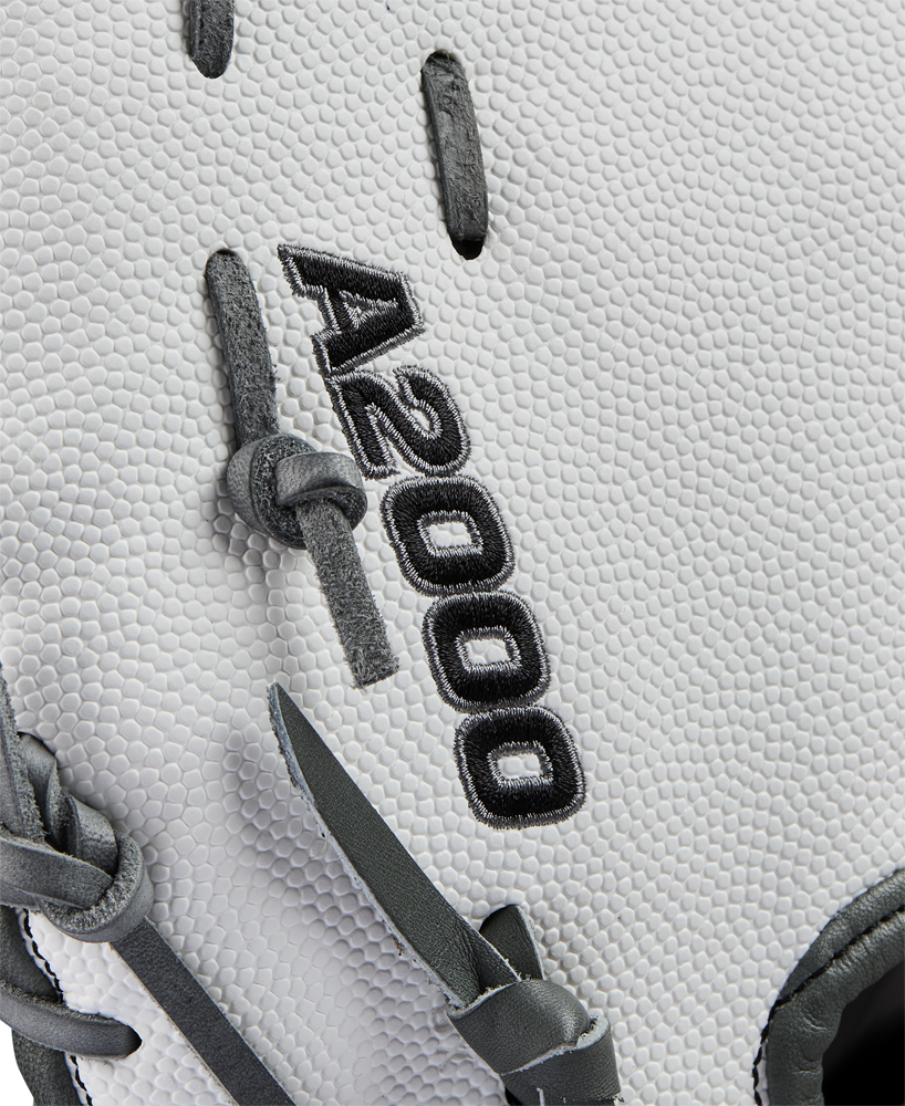 Close-up of a white Wilson A2000 1620SS 12.5" Fastpitch First Base Mitt (WBW102682125) with black laces, crafted from Pro Stock leather, and detailed with "A2000 1620" embroidered in black.