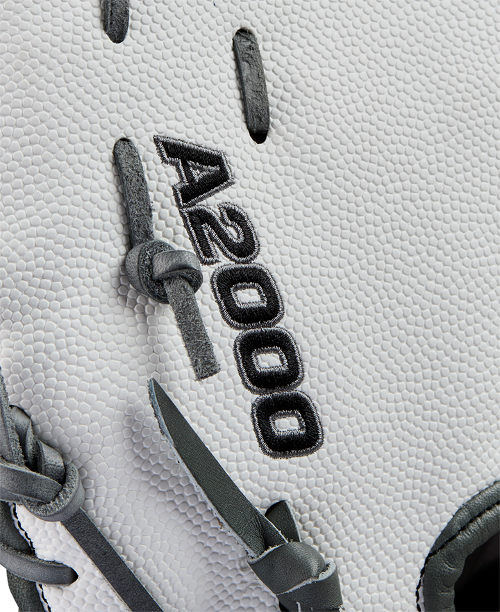 Close-up of a white Wilson A2000 1620SS 12.5" Fastpitch First Base Mitt (WBW102682125) with black laces, crafted from Pro Stock leather, and detailed with "A2000 1620" embroidered in black.