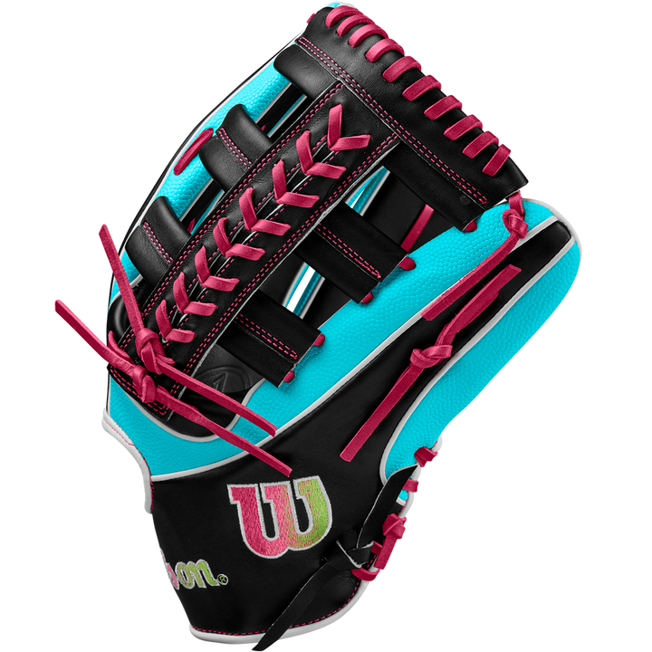 The Wilson A2K 1810SS 12.75" Baseball Glove (WBW1026881275) features black, turquoise, and white Pro Stock Select leather with bright pink laces and a yellow-pink Wilson logo, shown on a plain white background.