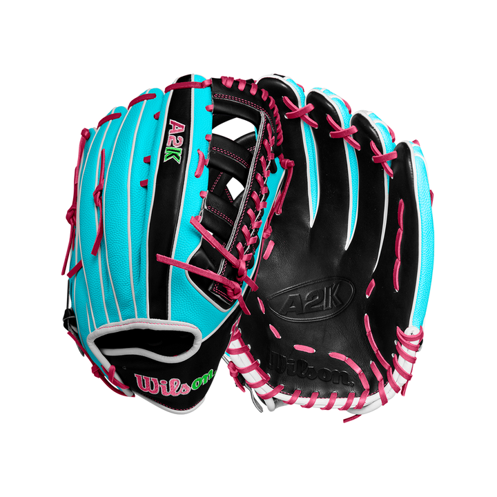 The Wilson A2K 1810SS 12.75" Baseball Glove (Winter 2024, WBW1026881275) features black, teal, and white leather with pink laces, an open web design, Pro Stock Select leather construction, and prominent Wilson branding.