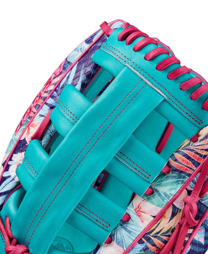 Close-up of the Wilson A2000 RA56 12.75" Randy Arozarena GM glove, featuring turquoise leather, red stitching, blue-pink-purple floral accents, and SuperSnakeSkin, inspired by Arozarena’s style.