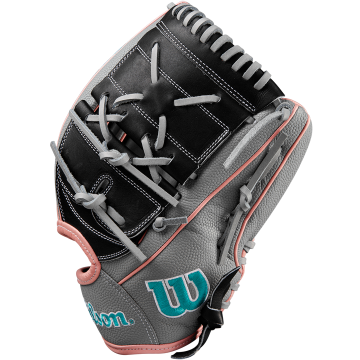 A Wilson A2000 MA14SS 12.25" Fastpitch Glove in grey with black and pink accents, teal W logo, and white stitching is crafted from Pro Stock leather and shown from the side on a white background.