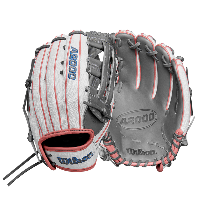 Two Wilson A2000 FP50SS 12.25" Fastpitch Gloves (FALL 2024: WBW1027371225) are shown—one displays the A2000 and Wilson logos on the outside, the other shows inside laces. Both use Pro Stock® Leather in white, grey, and pink.