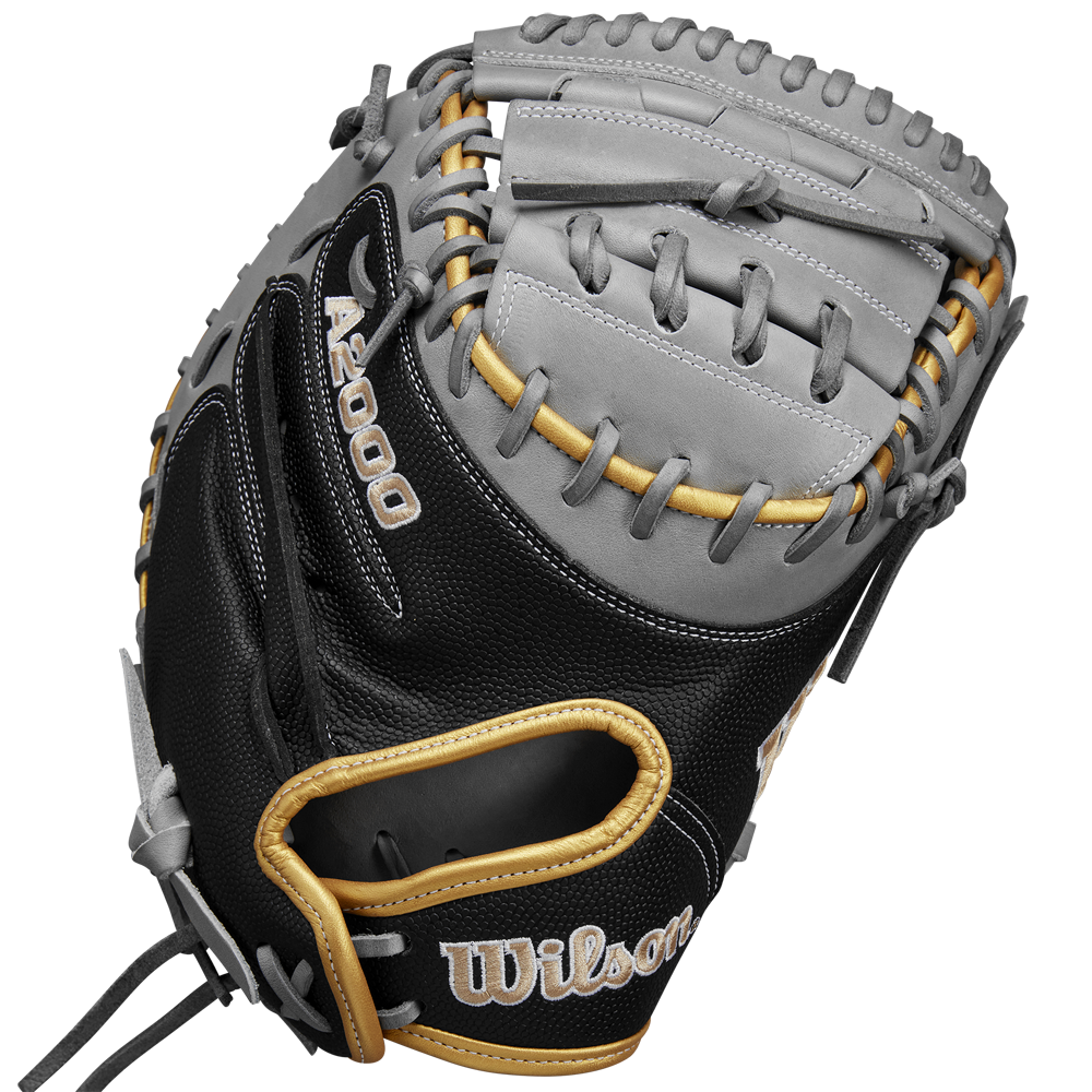 The Wilson A2000 FPCM23 34" Fastpitch Catcher's Mitt (SPRING 2025: WBW10274434) features a black, gray, and tan design with visible lacing and stitching, crafted from Pro Stock leather, shown on a plain white background.