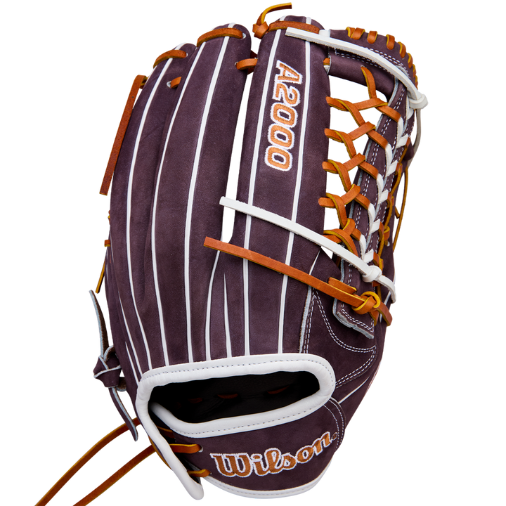 The Wilson A2000 T125 12.5" Aliyah Andrews GM Fastpitch Glove (WBW102745125) by Wilson features dark brown leather, white stripes, tan lacing, and embroidered A2000 and Wilson logos—ideal for fastpitch outfielders like Aliyah Andrews.