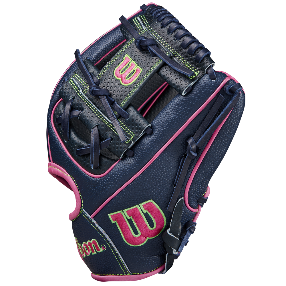 The Wilson A2000 DP15SS 11.5" Baseball Glove (SPRING 2025: WBW102747115) features navy blue leather, neon green accents, pink trim, and Pedroia Fit Technology for a snug fit, with green and pink Wilson logos on the thumb and wrist.