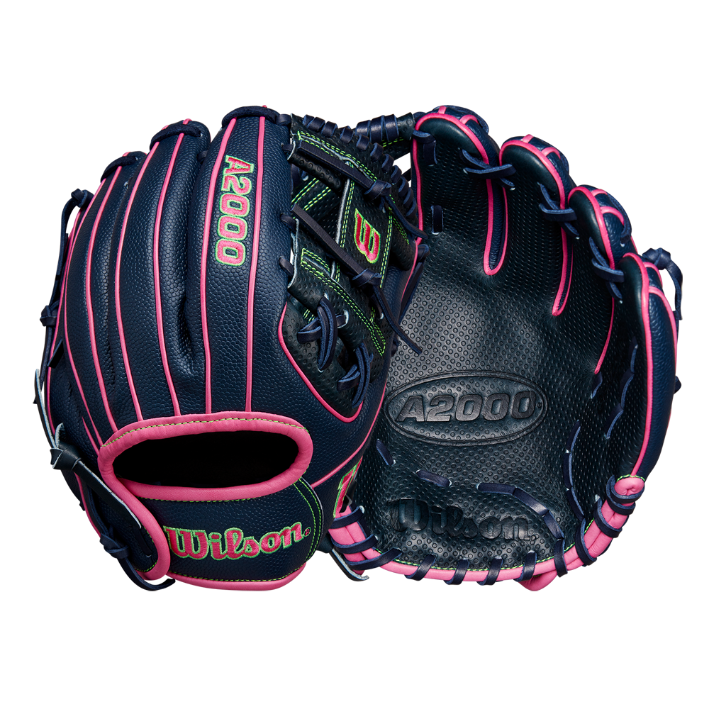 Two Wilson A2000 DP15SS 11.5" Baseball Gloves (Spring 2025, WBW102747115) in navy blue with pink lacing and Pedroia Fit Technology are shown in front and palm views on a plain white background.