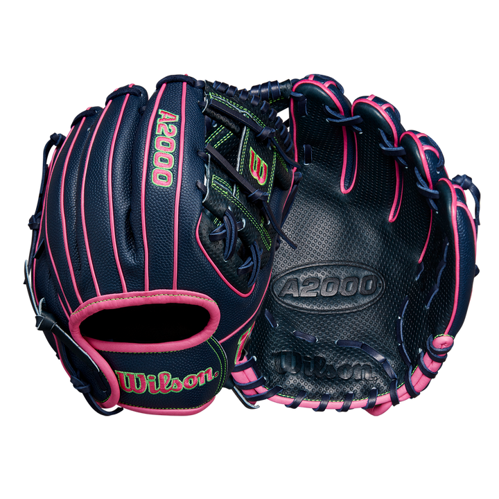 Two Wilson A2000 DP15SS 11.5" Baseball Gloves (Spring 2025, WBW102747115) in navy blue with pink lacing and Pedroia Fit Technology are shown in front and palm views on a plain white background.