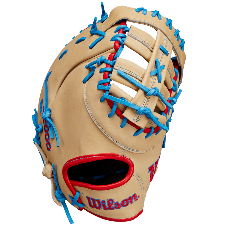 The Wilson A2000 1677 12.5" Baseball First Base Mitt (WBW102753125) features blue and red stitching and is crafted from durable Pro Stock leather for lasting performance on the field.