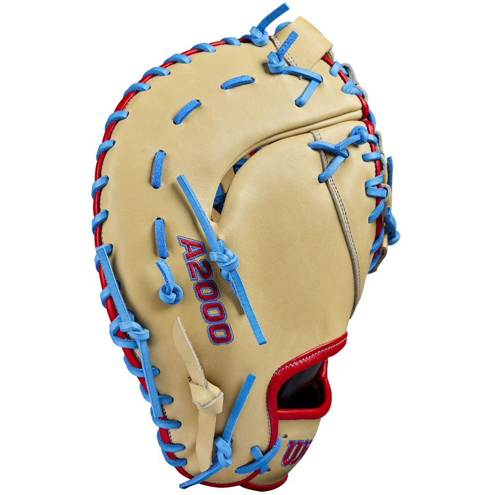 The Wilson A2000 1677 12.5" First Base Mitt features tan Pro Stock leather, blue laces, red wrist trim, and "A2000" stitched in blue and red on the palm for lasting performance.