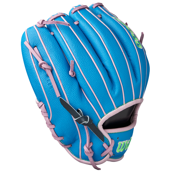 The Wilson A2000 1786SS 11.5" Baseball Glove (GOTM March 2025, WBW103479115) features blue Pro Stock leather with pink laces/trim, a black strap, green thumb lettering, and is displayed on a plain white background.