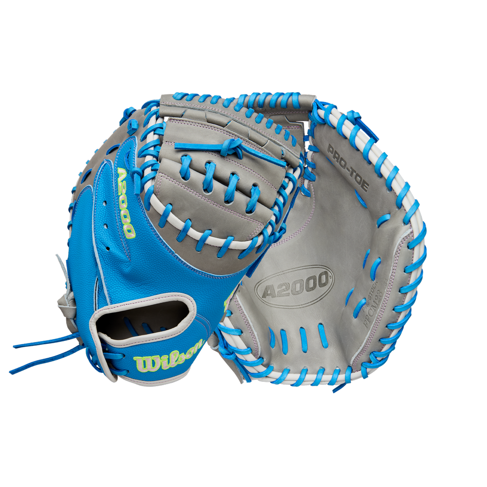 A Wilson A2000 FPCM23 34" Fastpitch Catcher's Mitt (FALL 2025: WBW10349134) in gray and blue with blue lacing, featuring visible Wilson and A2000 branding.