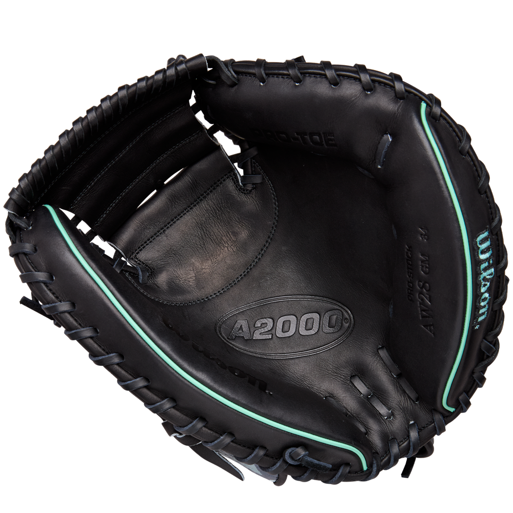 The Wilson A2000 AW28 34" Austin Wells Gameday Catcher's Mitt (FALL 2025: WBW10349434) by Wilson features a black design with teal accents and visible laces, shown open with the palm and pocket facing up—just like Austin Wells uses.