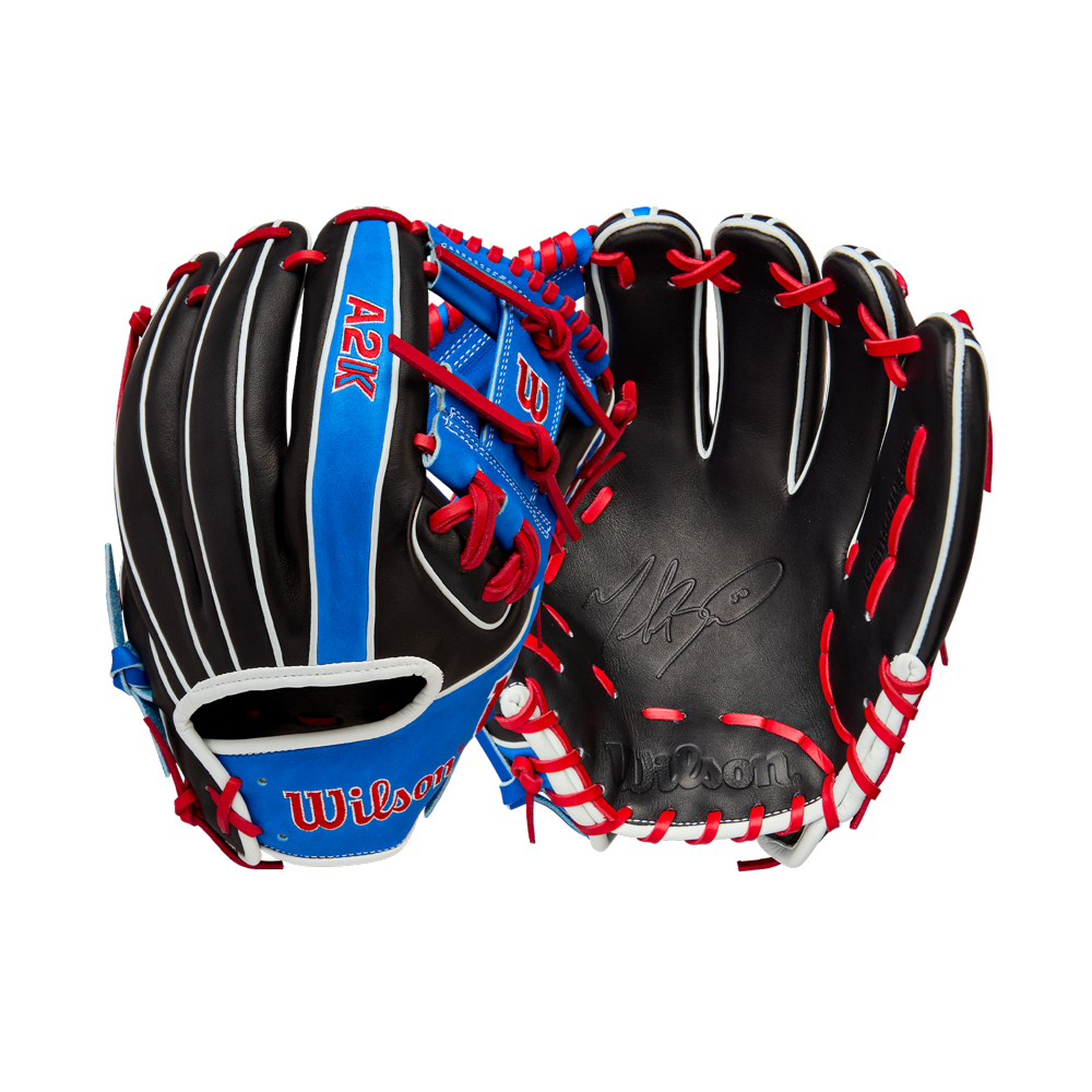 The Wilson A2K MB1175 11.75" Mookie Betts Gameday Glove (FALL 2025) features black Pro Stock Select leather, blue and red accents, red laces, white trim, visible stitching, a signature palm, and “Wilson”/“A2K” labels.