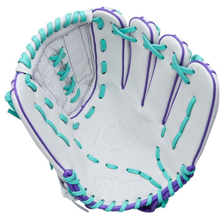 The Wilson A500 Siren 11.75" Fastpitch Glove (WBW1035581175) is a youth glove crafted from top grain leather, featuring white leather, teal and purple laces, intricate palm/webbing details, and a Quick-Fit Wrist.