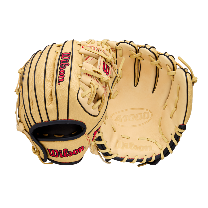 Two tan Wilson A1000 PF11 11" youth baseball gloves with black lacing—one palm side, one back—feature the red Wilson logo. Ideal for young players needing an 11” infield glove with Pedroia Fit. Brand: Wilson. Model: WBW10395511.