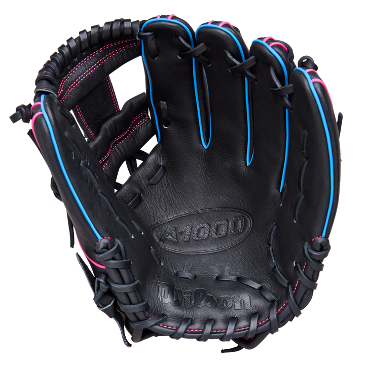 The Wilson A1000 DP15 11.5" Baseball Glove (WBW103956115) features a black design with pink stitching, blue trim, visible laces, and palm branding. Made from full grain leather for lasting performance.