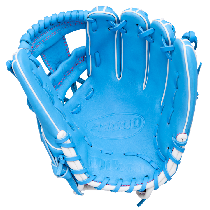 A Wilson A1000 1786 11.5" baseball glove (WBW103957115) in bright blue with white lacing and stitching, displayed palm side up against a white background.
