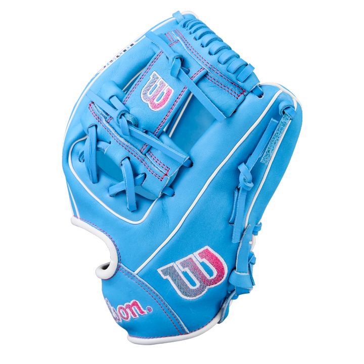 The Wilson A1000 1786 11.5" Baseball Glove (WBW103957115) by Wilson features bright blue Pro Stock leather with white and pink accents, plus the Wilson logo, displayed on a plain white background.