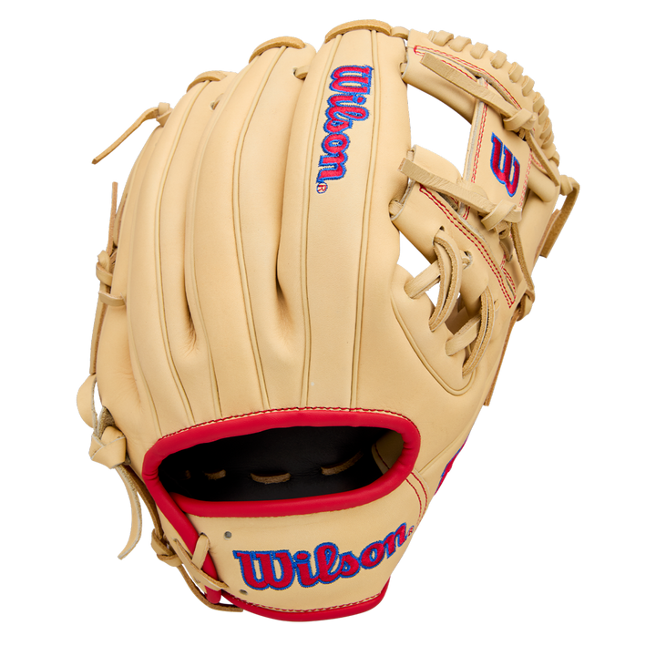 The Wilson A1000 1975 11.75" Baseball Glove (WBW1039591175) by Wilson features a tan design with red trim, blue Wilson logos on the wrist strap and back, brown laces, and an open web, displayed against a plain white background.