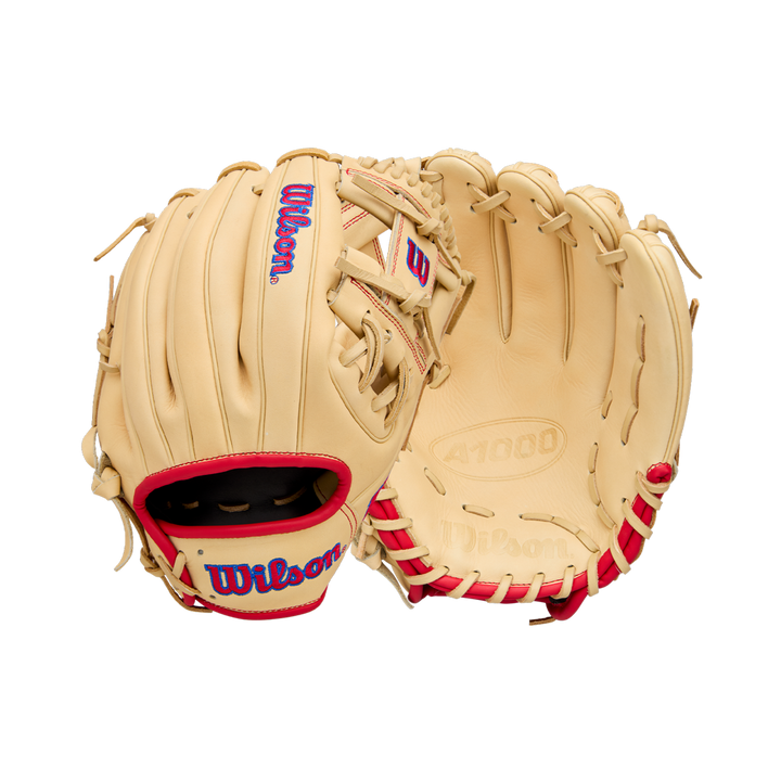 Two Wilson A1000 1975 11.75" baseball gloves (model WBW1039591175) in tan with red and blue accents, displayed to show both palm and laced sides. Ideal for youth infielders.