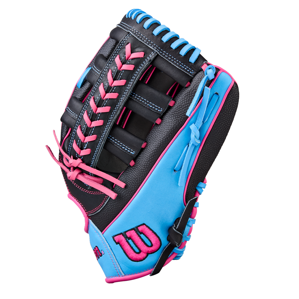 The Wilson A1000 1892 12.25" Baseball Glove (WBW1039621225) features a Pedroia Fit, black, bright blue, and pink sections with pink laces, blue accents, a B logo on the thumb, and Full Grain leather, shown on a plain white background.