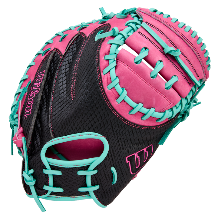 The Wilson A1000 CM33 33" Baseball Catcher's Mitt (WBW10396633) features full grain black leather with pink accents, bright turquoise lacing, and the Wilson logo on the thumb and pinky.