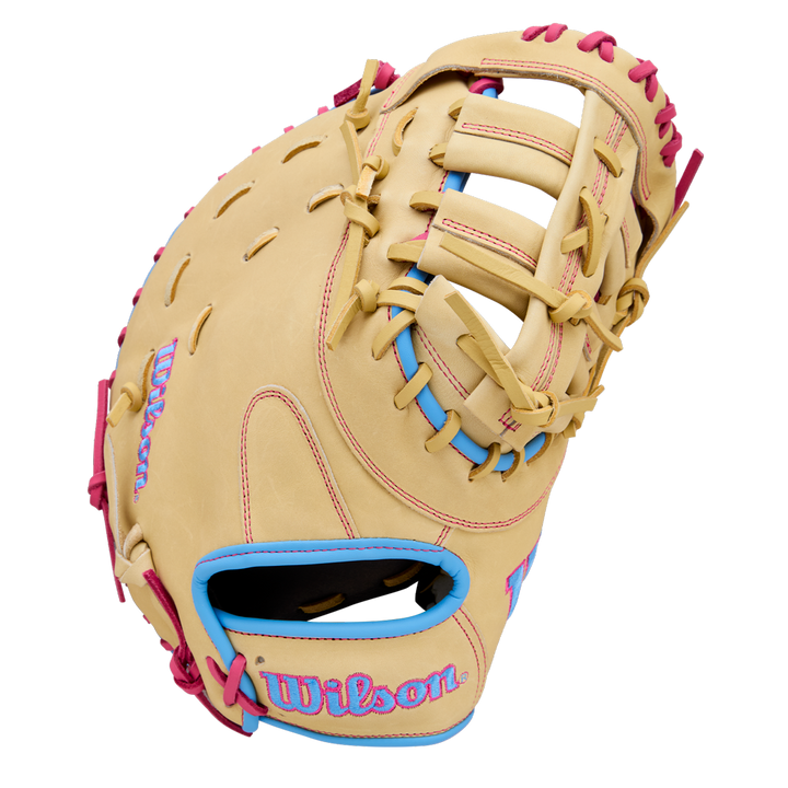 The Wilson A1000 1620 12.5" Baseball First Base Mitt (WBW103967125) features tan full grain leather, pink lacing, blue accents, and a pink-and-blue Wilson logo on the thumb and wrist area, shown on a white background.