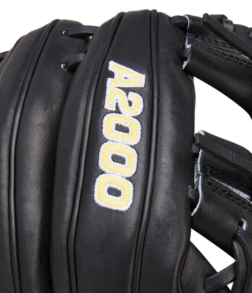 Close-up of a black Wilson A2000 1788 11.25" Baseball Glove (WBW1041051125) with white and gold A2000 embroidery. Made from Pro Stock Leather, the glove’s detailed stitching and texture are clearly visible.