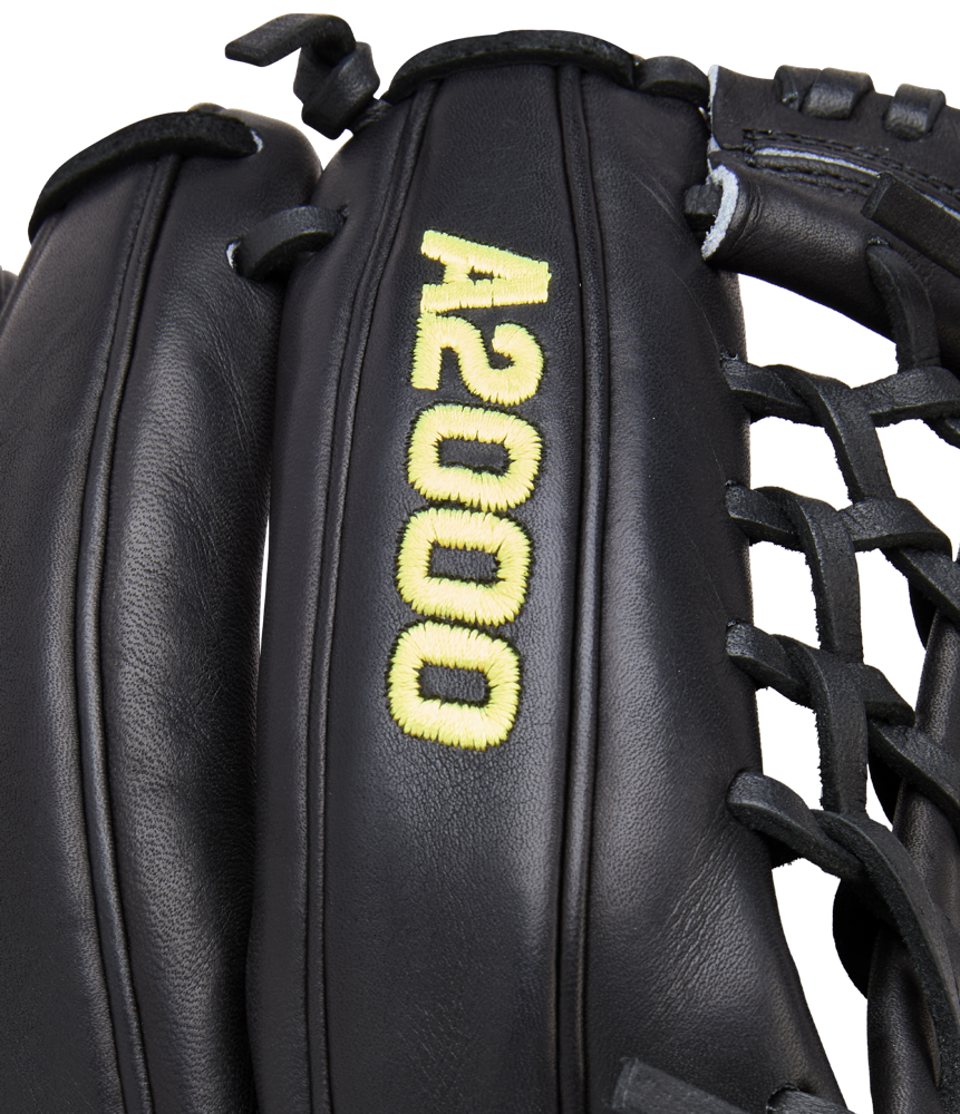 Close-up of the Wilson A2000 1789 11.5" Baseball Glove (WBW104106115), crafted with Pro Stock leather. This black Wilson glove features yellow "A2000" stitching, black laces, and detailed craftsmanship.