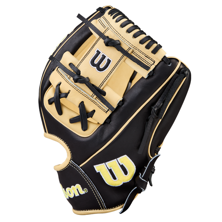 A Wilson A2000 1786 11.5" baseball glove, black and tan with black laces, H-Web design, and yellow-and-white Wilson W logos on thumb and wrist, displayed on a plain white background.