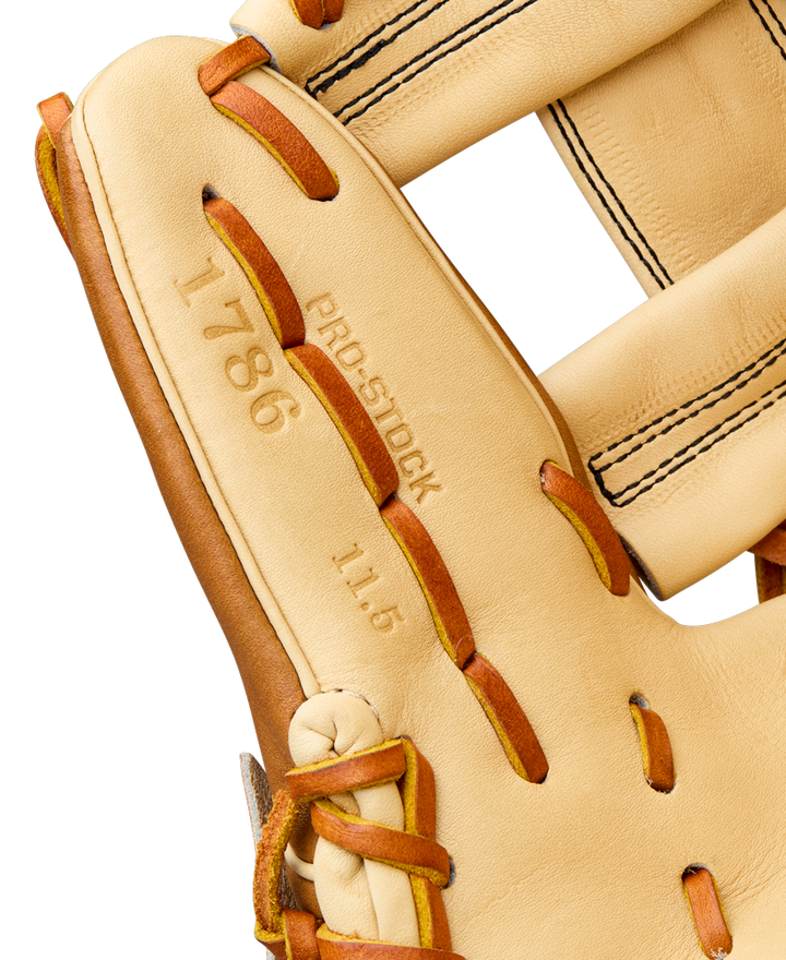 Close-up of the Wilson A2000 1786 11.5" Baseball Glove, crafted from Pro Stock Leather, featuring embossed '1786', 'PRO STOCK', and '11.5"', plus brown laces and detailed stitching. Model: WBW104109115.